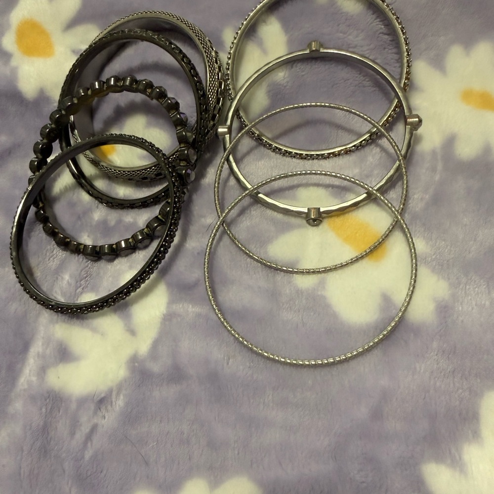 Stylish Silver and Black Bangle Set
You get all for one low price - Picture 4 of 12